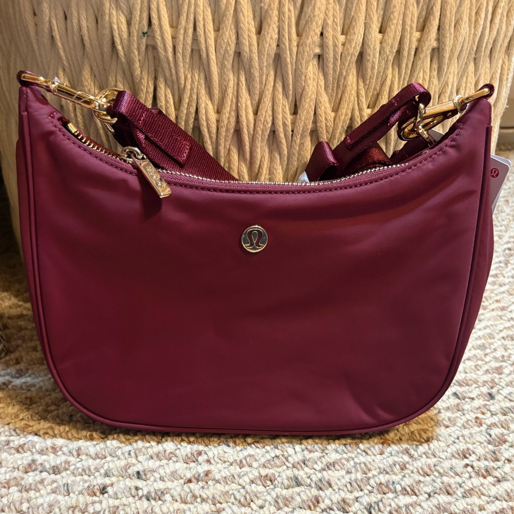 Lululemon Athletica Wine Berry and Gold Adjustable Mini Shoulder Bag
